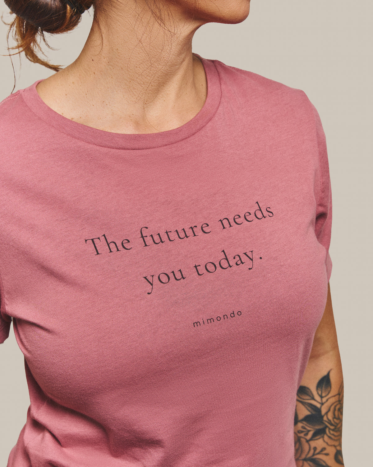 Close-up of the print on the Future Tee: The future needs you today. With mimondo printed beneath.
