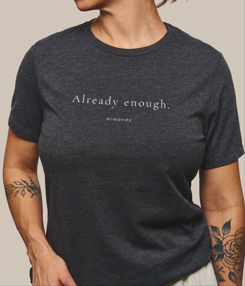 Close-up of the print on the Strength Tee: Already enough. With mimondo printed beneath.