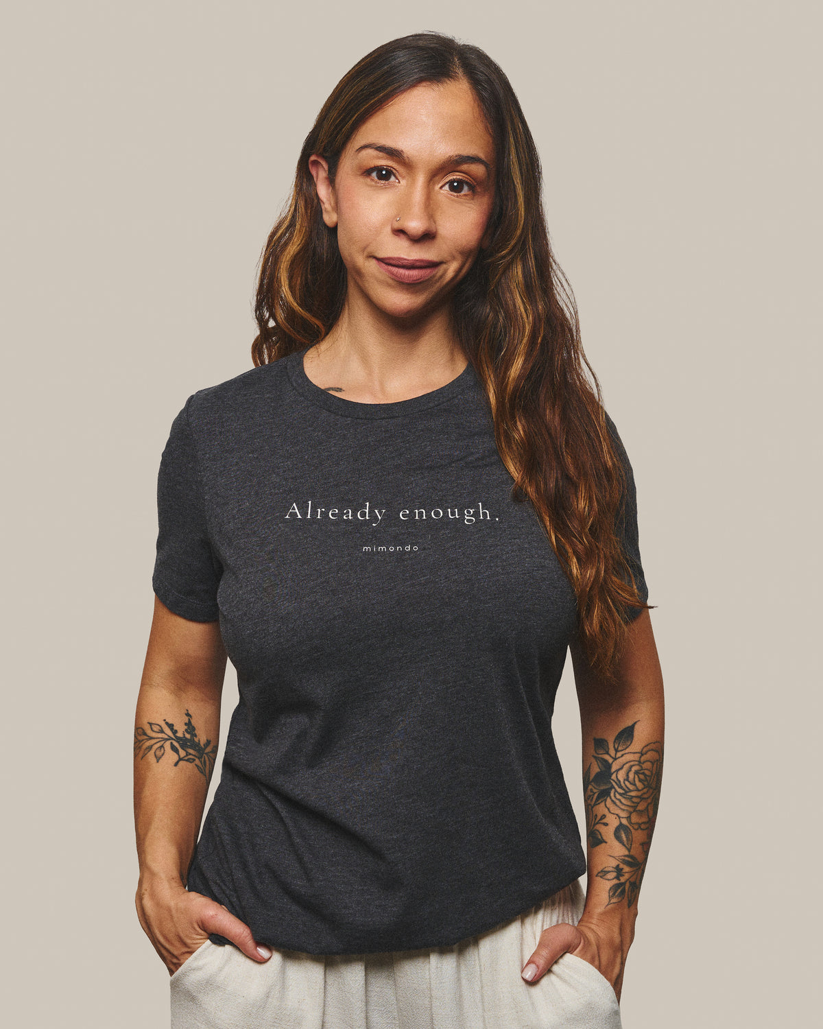 The Strength Tee in Dark Grey Heather. The print reads: Already enough.